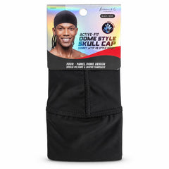Black dome style skull cap in retail packaging, with a printed header card showing a model wearing it and product text including 'ACTIVE-FIT DOME STYLE SKULL CAP' and 'FOUR - PANEL DOME DESIGN'.