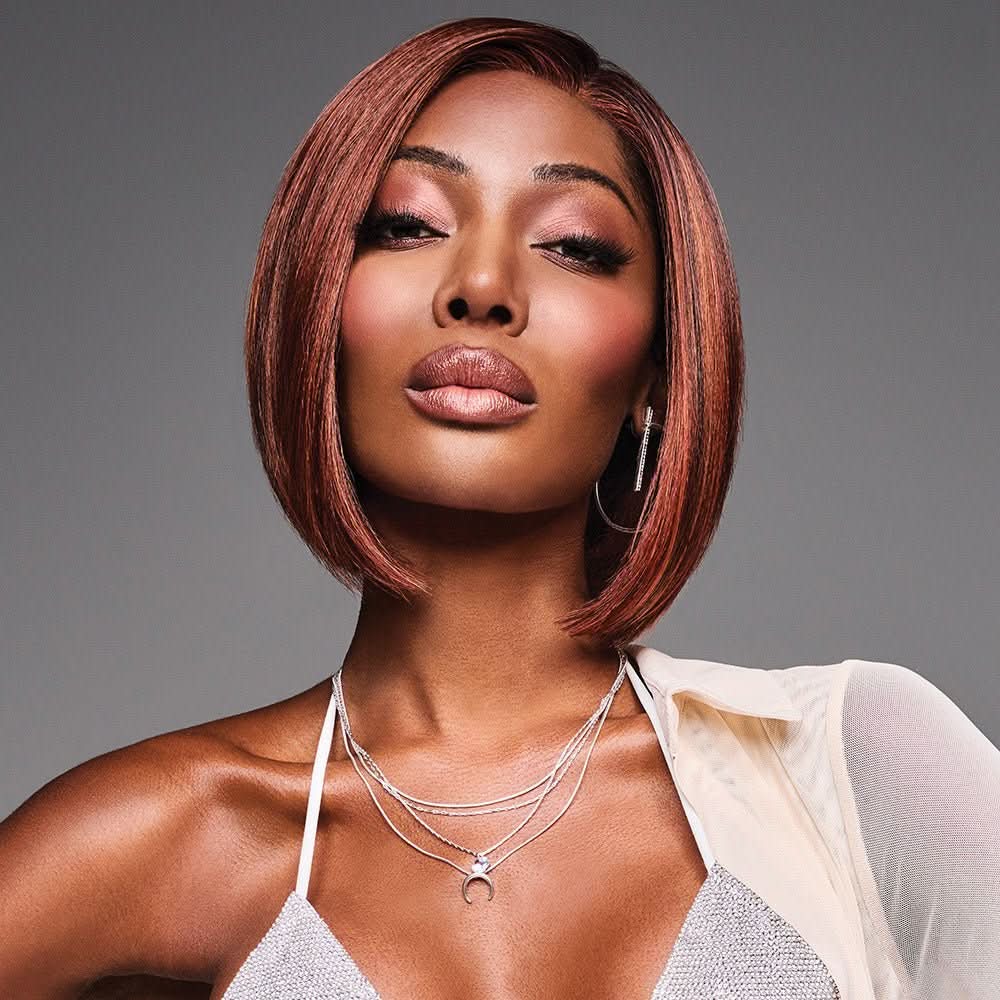 Woman wearing Hailey Wig in Cherry Cola while slightly looking up - View from the front