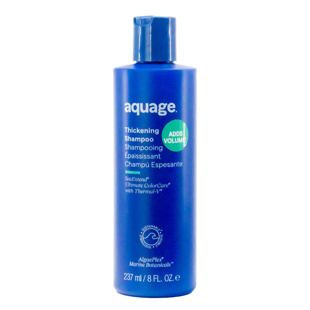 Blue shampoo bottle with 'aquage' branding on a white background
